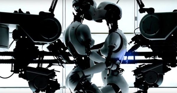 Robots kiss in Bjork music video.