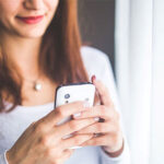 Girl using a smartphone.