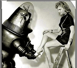 A robot helps a woman put on her shoe.