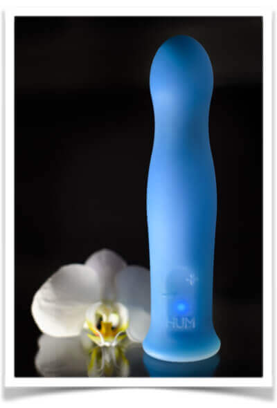 The Blue Glow Hum vibrator glows electric blue in the dark