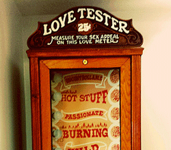 A photo of a "love tester" machine.