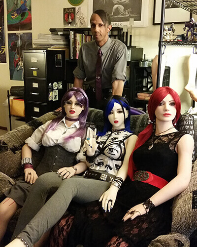 Davecat and his synthetic ladies Shi-chan, Lenka, and Miss Snow.