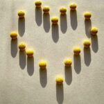 Tablets are placed in the shape of a heart.