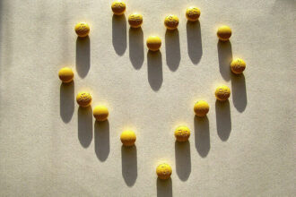 Tablets are placed in the shape of a heart.