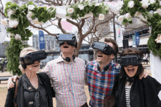 People in Sydney watch a same-sex marriage in New Zealand.