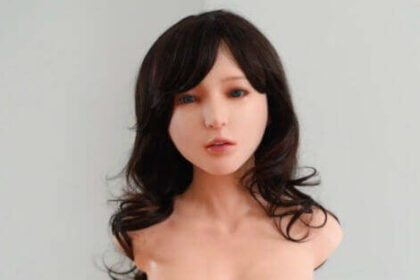 A dark-haired robotic head of a Chinese-made gynoid.
