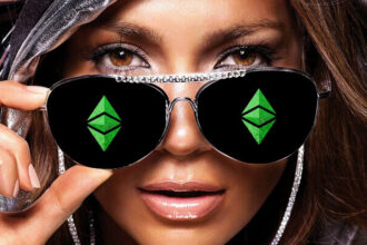 A woman wearing aviatar sunglasses with the Ethereum logo on each lens.