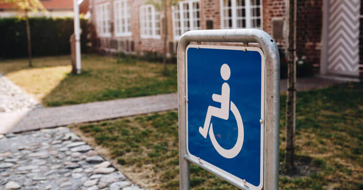 person with disability sign in front of a house