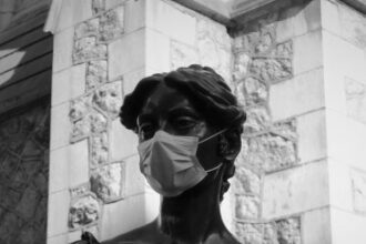 Screenshot of a status wearing face mask