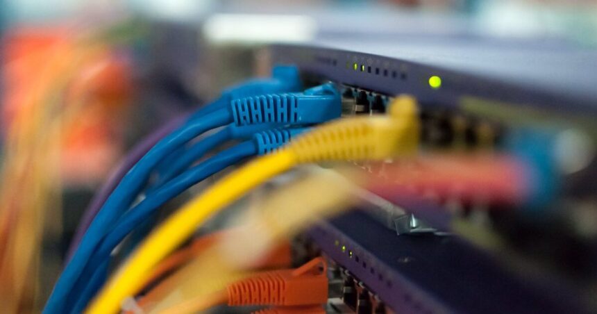 Image of Computer Server System with Red, Blue and Yellow Wires