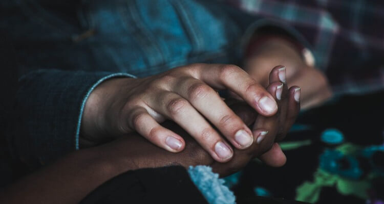Picture of couple holding hands
