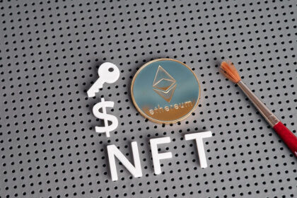 NFT letters and ethereum-style coin with paintbrush