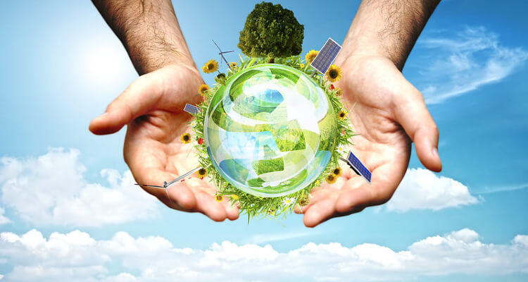 hands holding green orb with green energy
