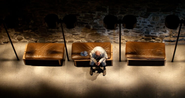 Person sitting alone