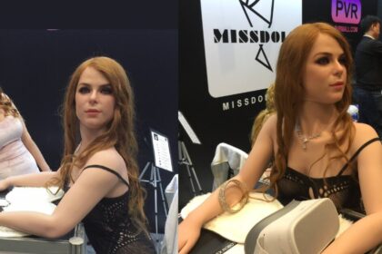 Adult performer Penny Pax poses next to a sex doll replica of herself at AVN 2019 in Las Vegas.
