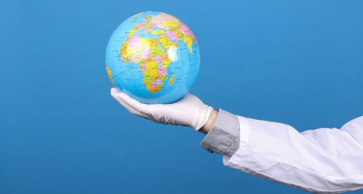 Image of Globe in hands, coronavirus pandemic in world. Concept of global quarantine during the COVID-19