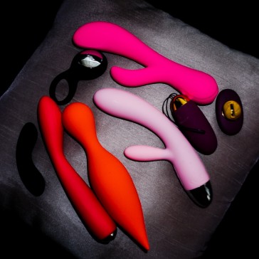 Image of popular sex toys placed on Pillow