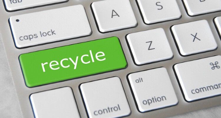 Screenshot of keyboard with green 'recycle' enter key