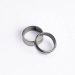 Two plain silver wedding bans sitting against a white background.