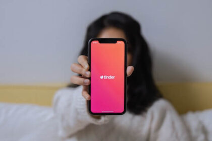 A Woman Showing Her Smartphone.