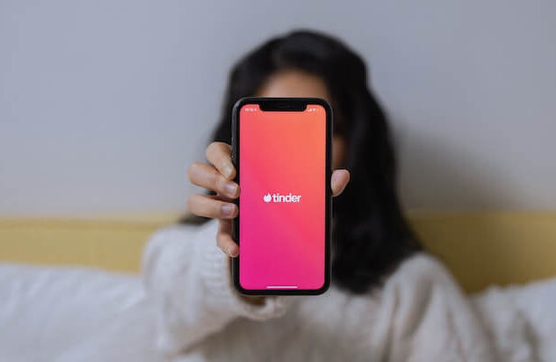 A Woman Showing Her Smartphone.