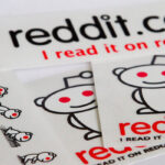 A pile of stickers that have the Reddit logo and says "I read it on reddit".